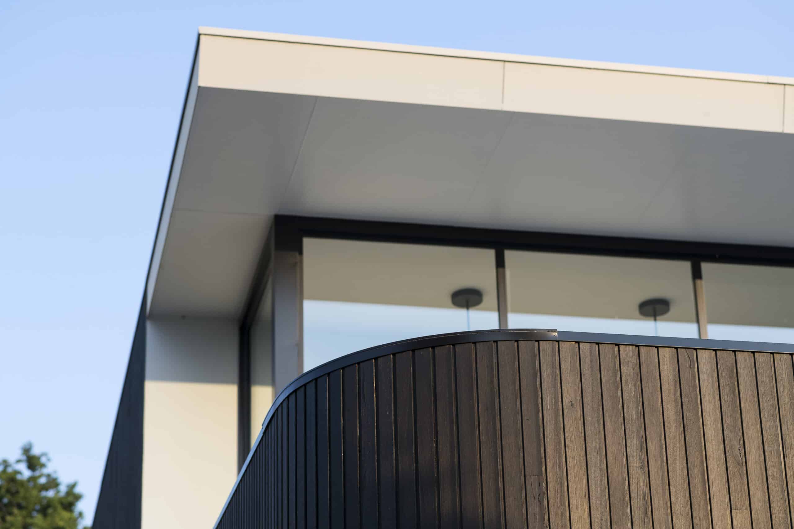 European box gutters along the roofline of a contemporary Tucson home