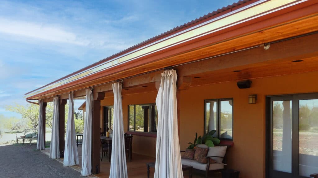 Copper gutter running along a covered patio at a Southern Arizona home